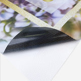 Adhesive Window Perf — window perf applied to commercial glass
